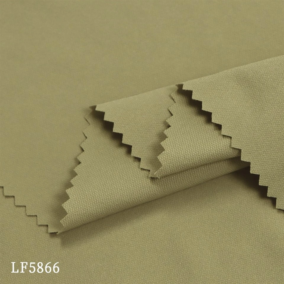 Tessuto Jacquard a pois perlati